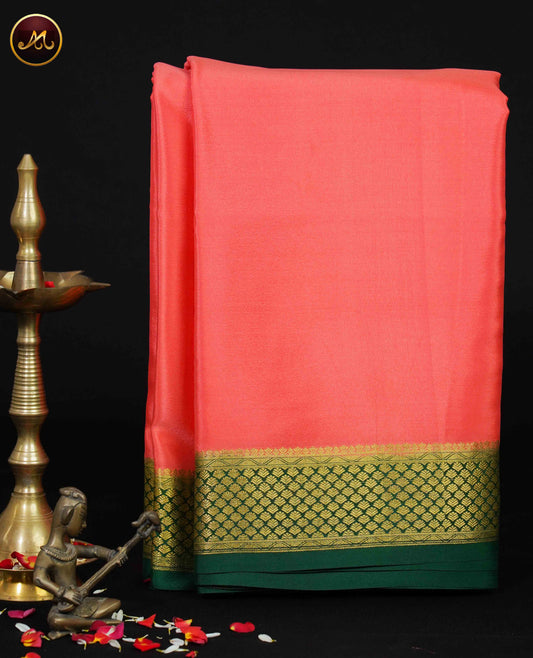 Mysore Crepe Silk saree with KSIC finish in Peach and Bottle Green combination with Gold Zari Border and Chit  Pallu