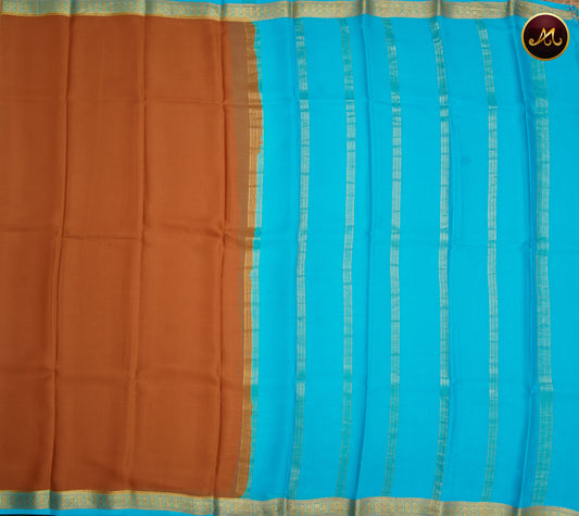 Mysore Crepe Silk saree with KSIC finish in Chikoo  and  Sky Blue combination with Golden Zari Border  and Chit  Pallu