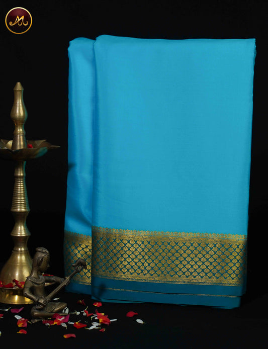 Mysore Crepe Silk saree with KSIC finish in Sky Blue and Peacock Blue combination with Gold Zari Border and Chit  Pallu