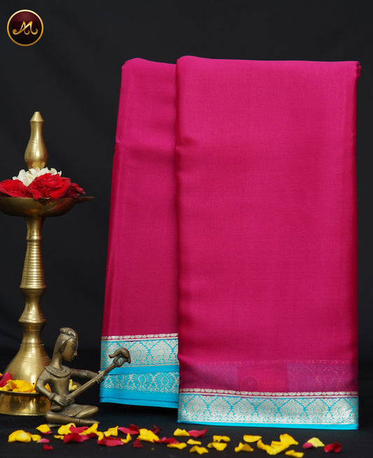 Mysore Crepe Silk saree with KSIC finish in Rani Pink  and  Sky blue combination with Silver Zari Border  and Chit  Pallu