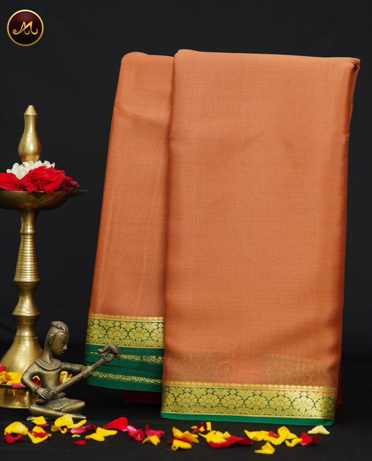 Mysore Crepe Silk saree with KSIC finish in Chikoo  and Bottle Green combination with Golden Zari Border  and Chit  Pallu