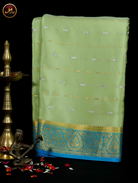 Mysore Crepe Silk saree with KSIC finish in Sea Green and Sky Blue combination with Gold-Silver Zari butta and Rich  Pallu