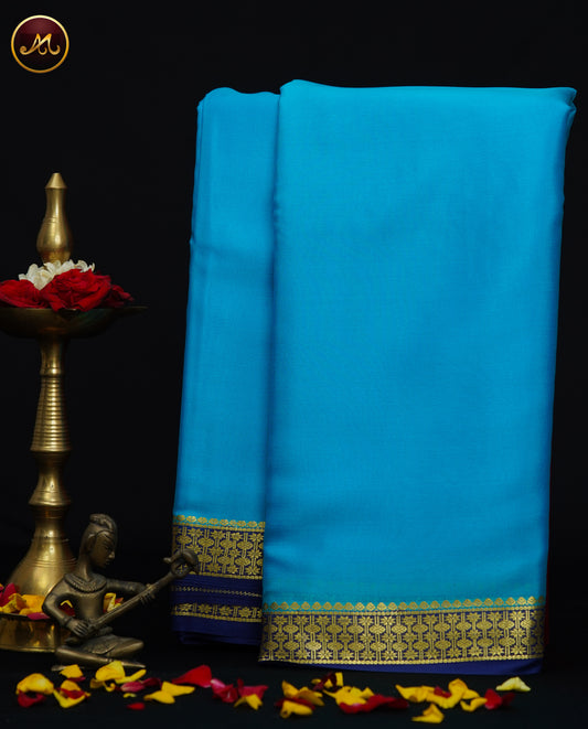 Mysore Crepe Silk saree with KSIC finish in Ananda Blue  and Navy Blue combination with Golden Zari Border and Chit  Pallu