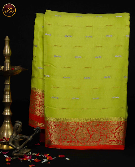 Mysore Crepe Silk saree with KSIC finish in Lemon Green  and Orange combination with Gold-silver Zari Butta  and Rich  Pallu