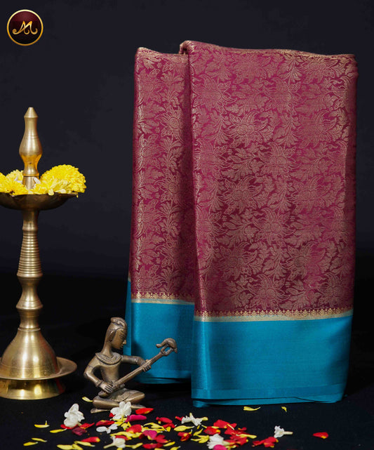 Mysore Crepe Silk saree with KSIC finish in Maroon and Ananda Blue combination with Gold Zari Brocade work allover the body and Chit  Pallu