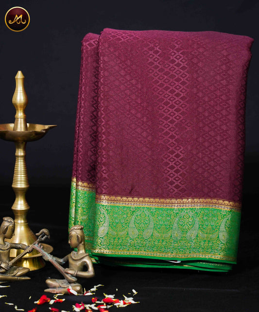 Mysore Crepe Silk saree with KSIC finish in Deep Brown and  Leaf Green combination with embosss work allover the body and Rich  Pallu