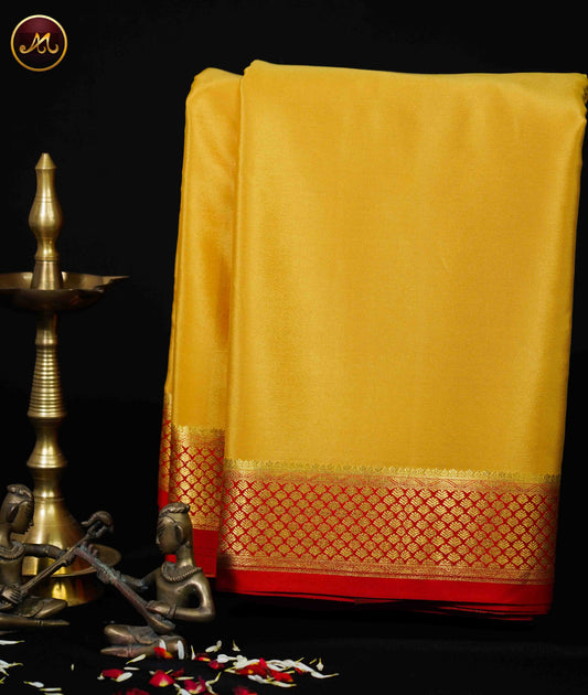 Mysore Crepe Silk saree with KSIC finish in Tussar Yellow and Red combination with Gold Zari Border and Chit  Pallu