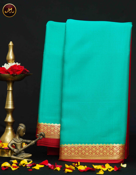 Mysore Crepe Silk saree with KSIC finish in Rama Green and red combination with Gold Zari Border and Chit  Pallu
