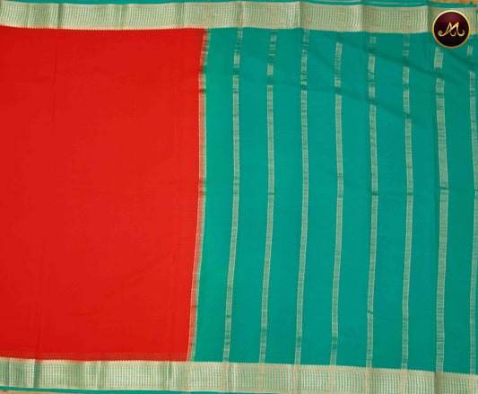 Mysore crepe silk saree with KSIC  finish in Orange and Teal combination with gold zari border and chit pallu