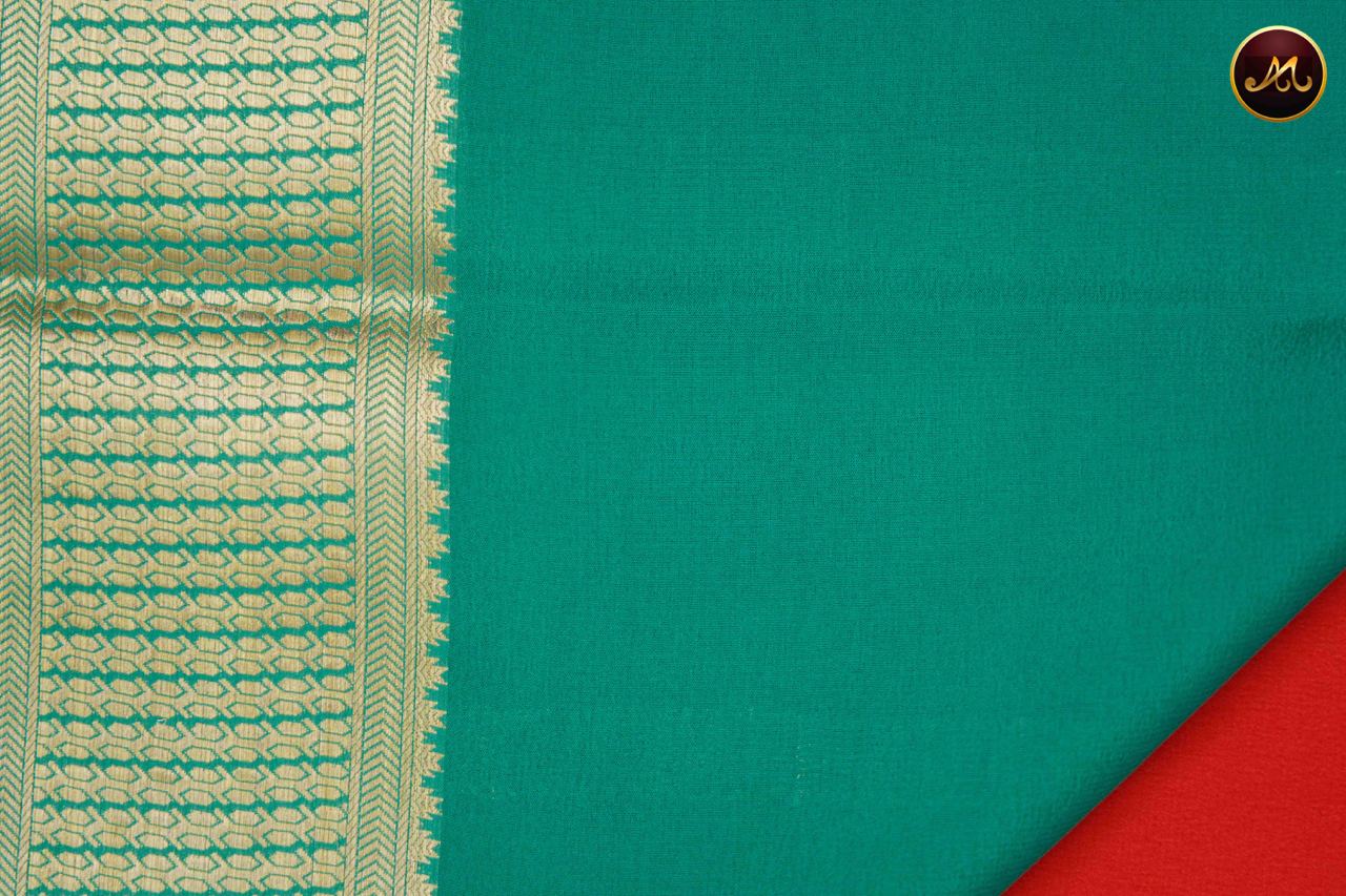 Mysore crepe silk saree with KSIC  finish in Orange and Teal combination with gold zari border and chit pallu