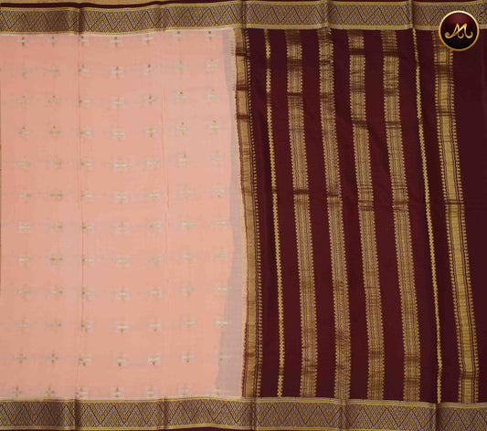 Mysore crepe silk saree with KSIC Finish in Peach and Dark Maroon combination and silver and gold zari butta and chit pallu