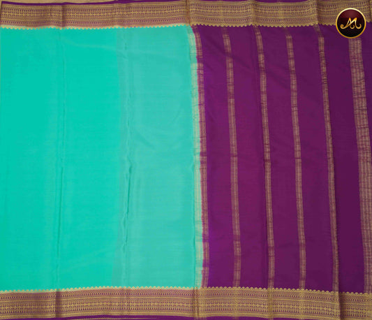 Mysore crepe silk saree with KSIC Finish in Distemper Green and Dark Purple combination with gold zari border and chit pallu