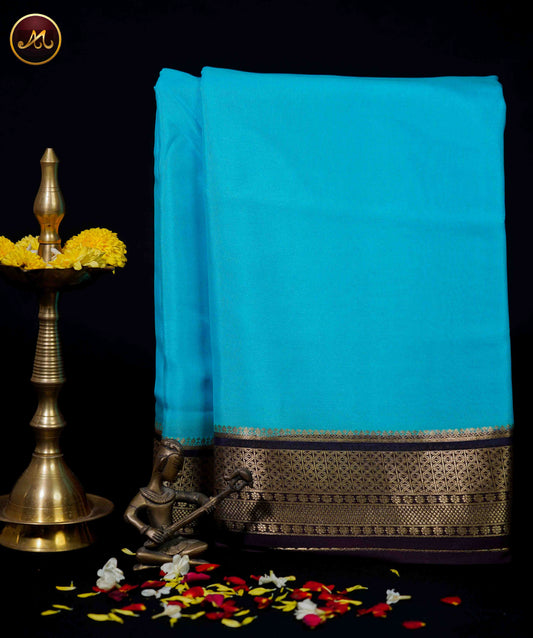 Mysore crepe silk saree with KSIC Finish in Sky Blue and Dark Brown combination with gold zari border and chit pallu