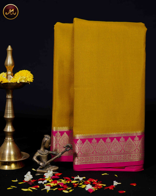 Mysore crepe silk saree with KSIC Finish in Chutney Green and Rani Pink combination with gold zari border and chit pallu