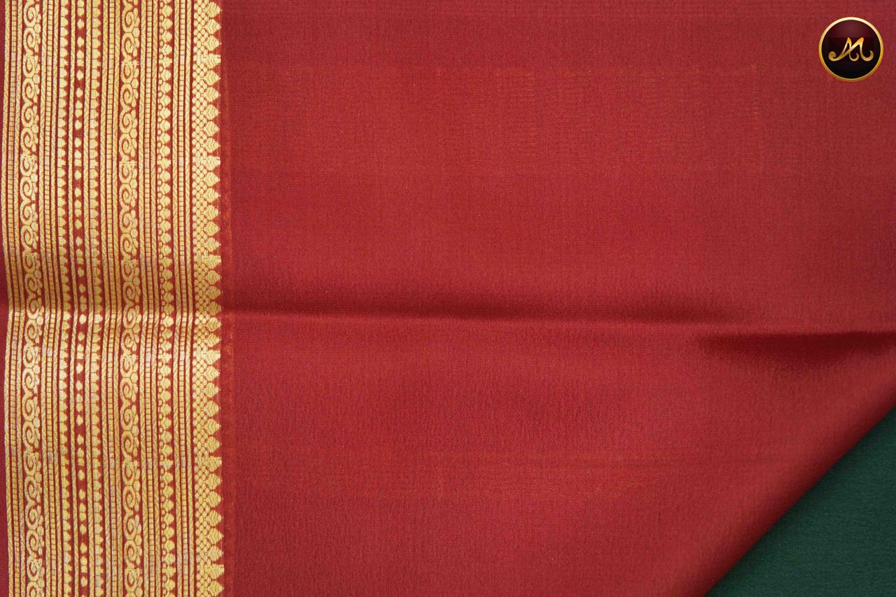 Mysore crepe silk saree with KSIC Finish in Bottle Green and Magenta Pink combination with gold zari border and chit pallu