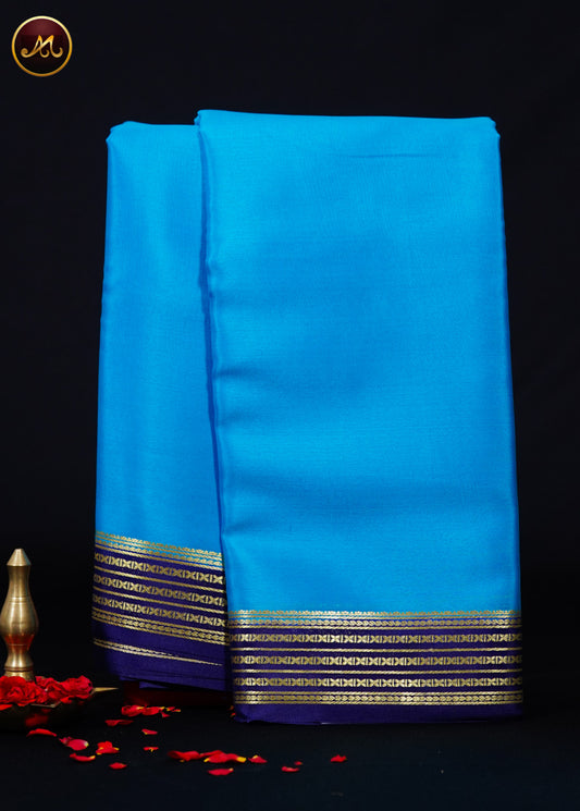 Mysore Crepe Silk saree with KSIC finish in Ananda Blue  and navy Blue combination with Gold Zari Border and Chit Pallu