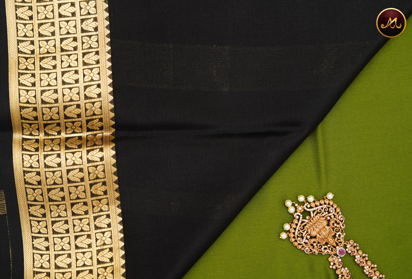 Mysore Crepe Silk saree with KSIC finish in Leaf Green  and Black combination with Gold Zari Border and Chit Pallu