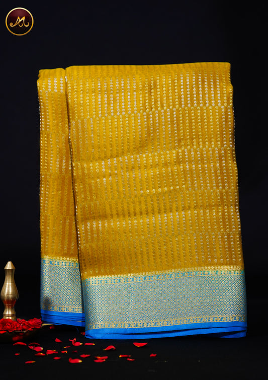 Mysore Crepe Silk saree with KSIC finish in Olive Green and Ananda Blue combination with Gold Zari Dots and Grand Pallu