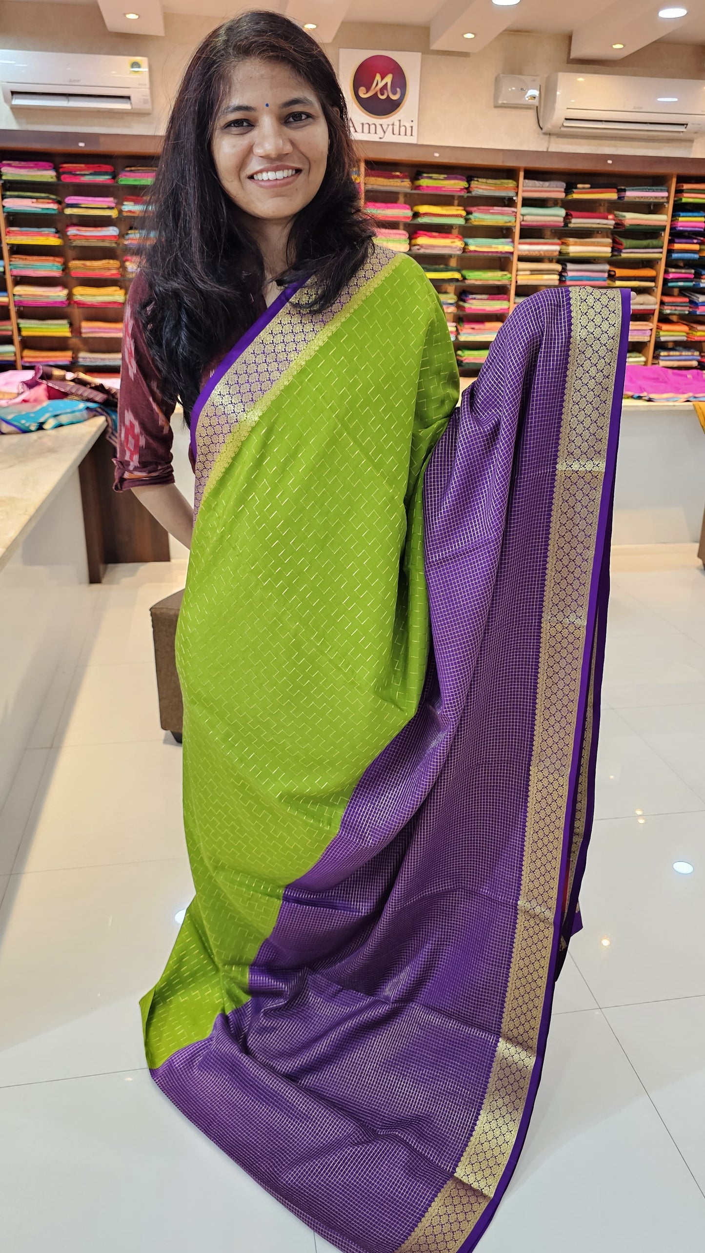 Mysore crepe silk saree with KSIC Finish in green with purple in half and half checks pattern