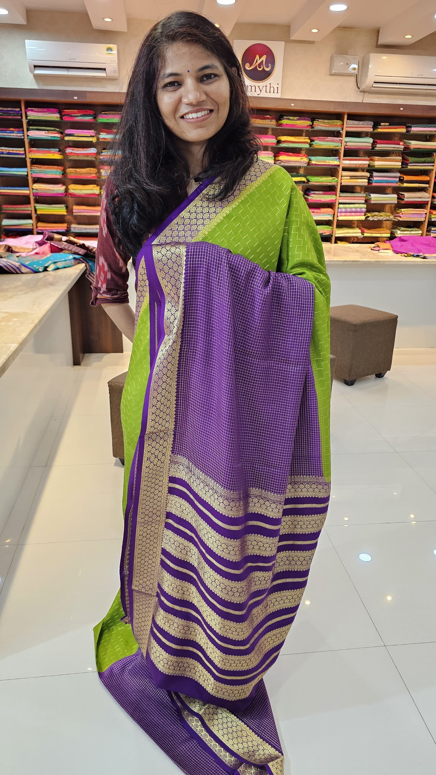 Mysore crepe silk saree with KSIC Finish in green with purple in half and half checks pattern