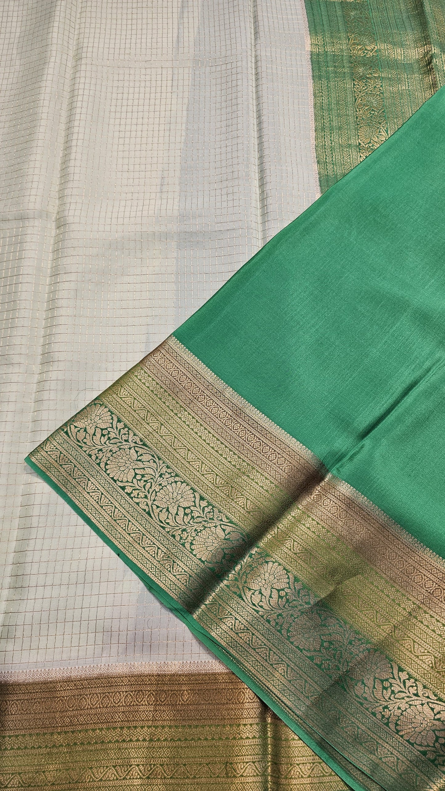 Mysore crepe silk saree with KSIC Finish in pista with leaf green checks pattern in kanchi border