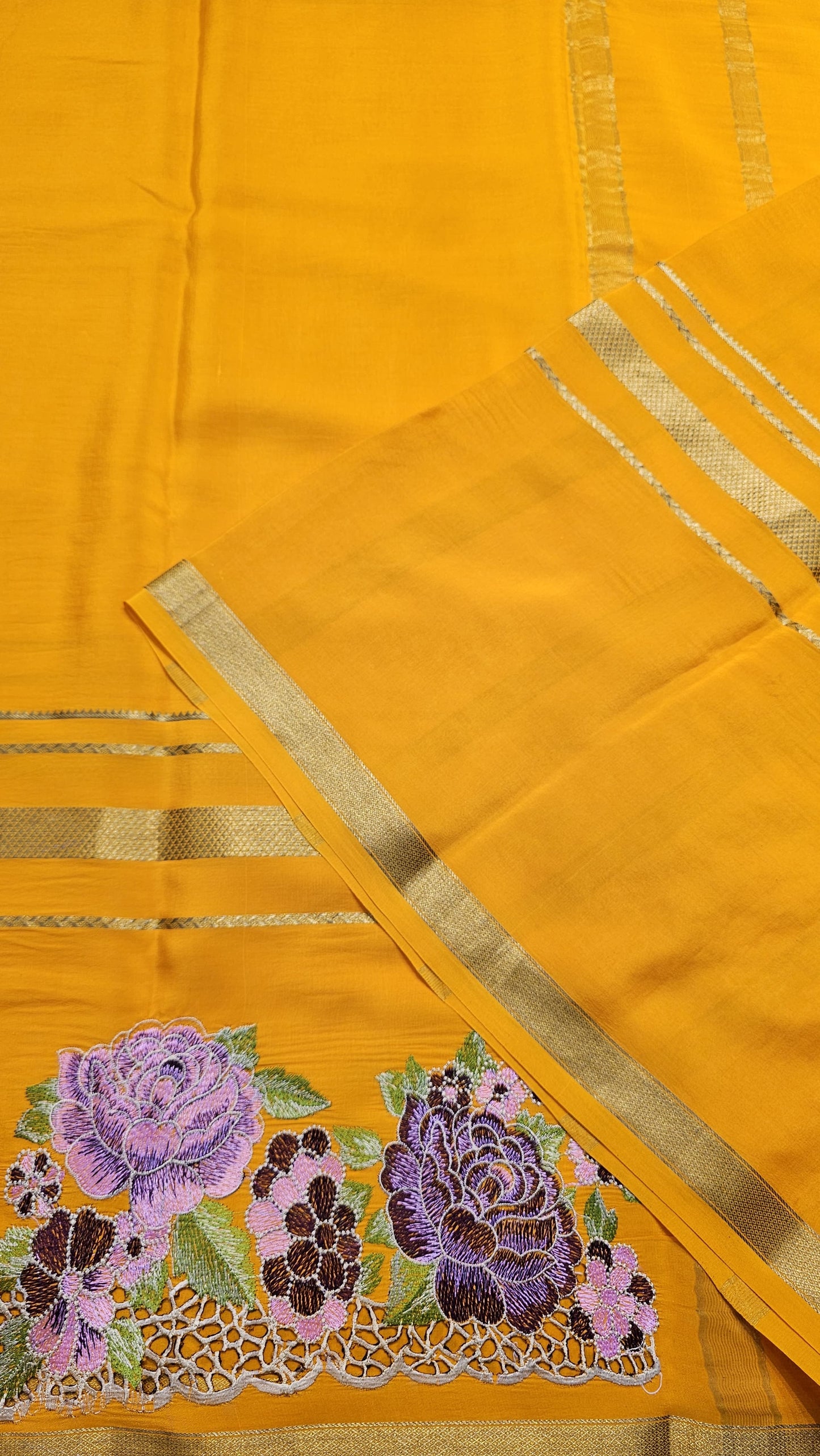 Mysore crepe silk saree with KSIC Finish in orange self in one side cutwork pattern