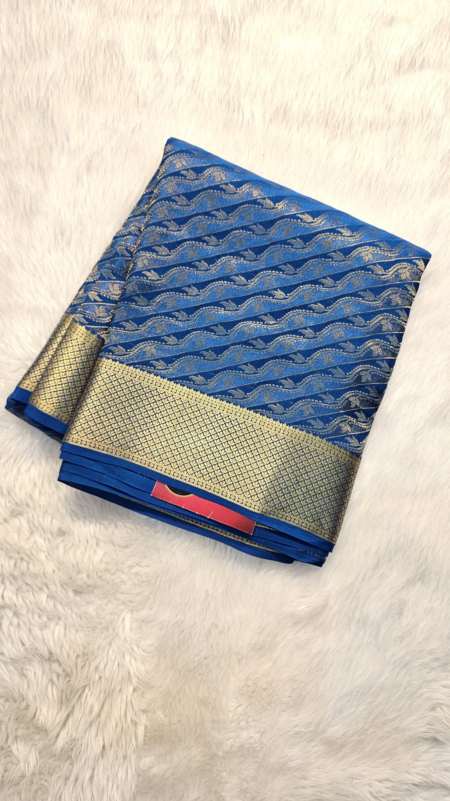 Mysore crepe silk saree with KSIC Finish in peacock blue in allover zari brocade pattern