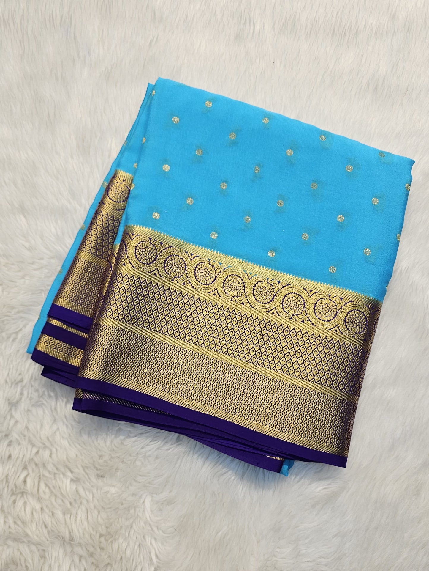 Mysore crepe silk saree with KSIC Finish in sky blue with purple in allover zari buttas pattern