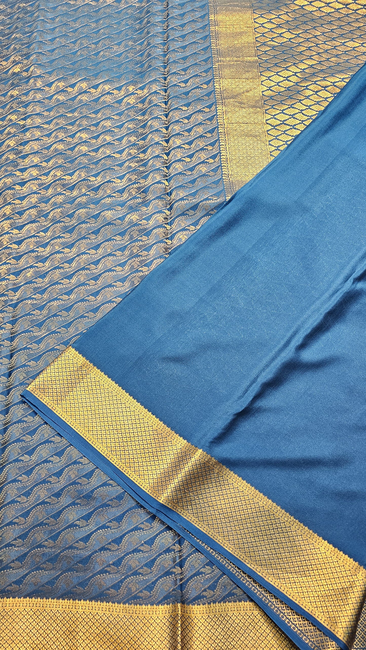 Mysore crepe silk saree with KSIC Finish in peacock blue in allover zari brocade pattern