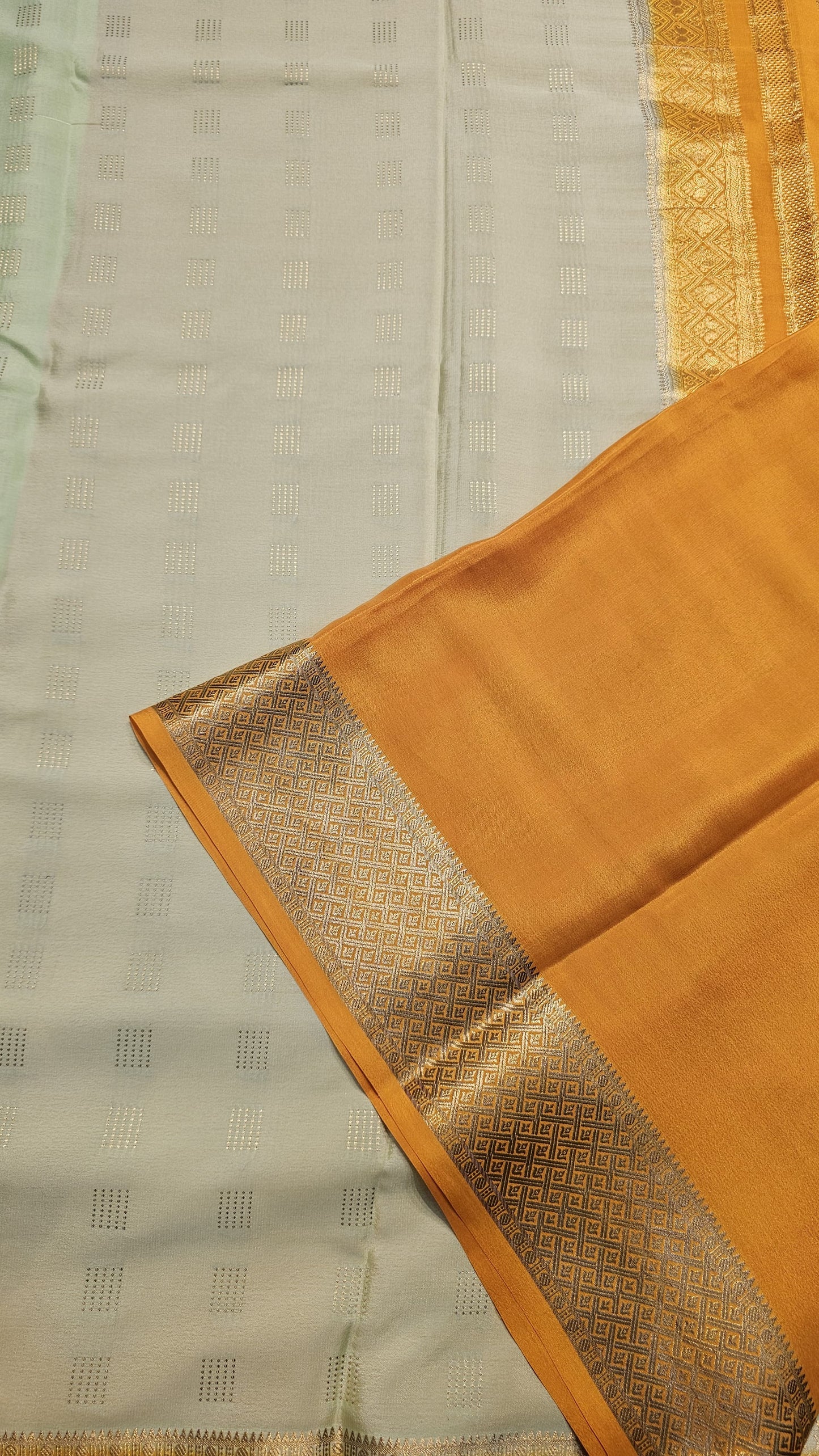 Mysore crepe silk saree with KSIC Finish indistemper green with mango yellow in checks pattern