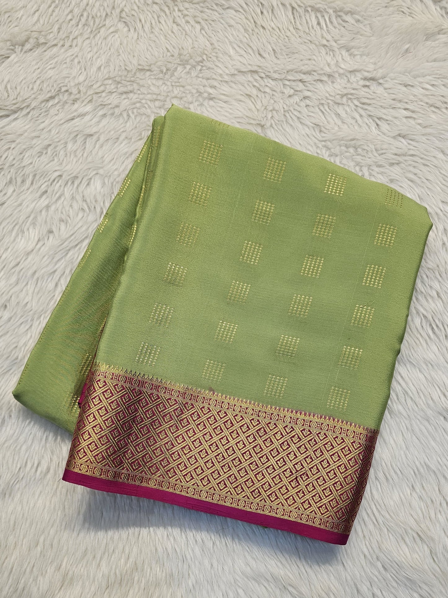 Mysore crepe silk saree with KSIC Finish in pista green with rani pink in checks pattern