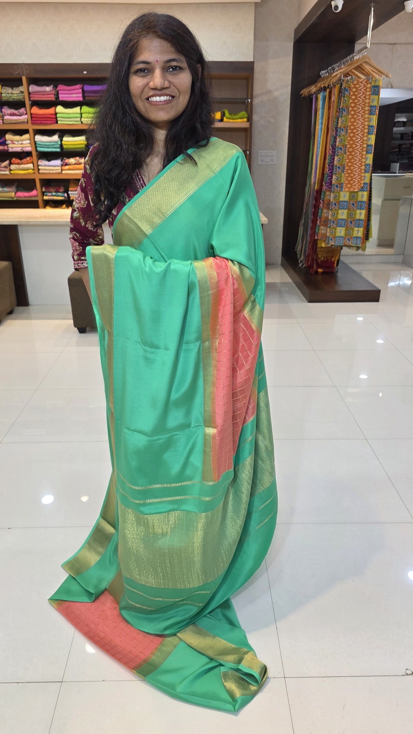 Mysore crepe silk saree with KSIC Finish in rama green with peach pink, in middle checks pattern