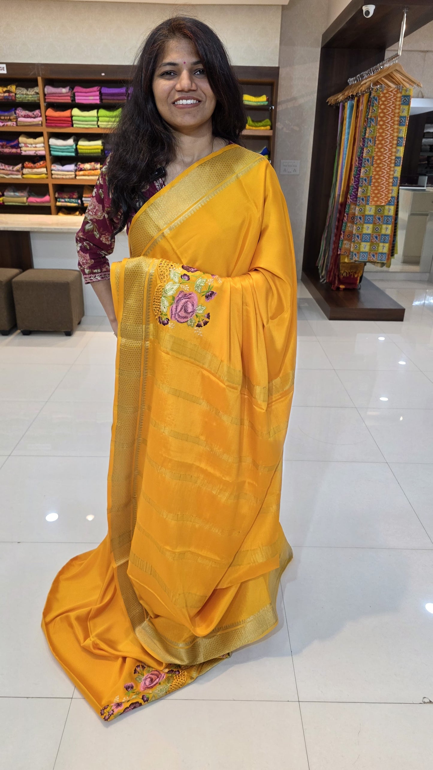 Mysore crepe silk saree with KSIC Finish in mango yellow self in one side cutwork pattern