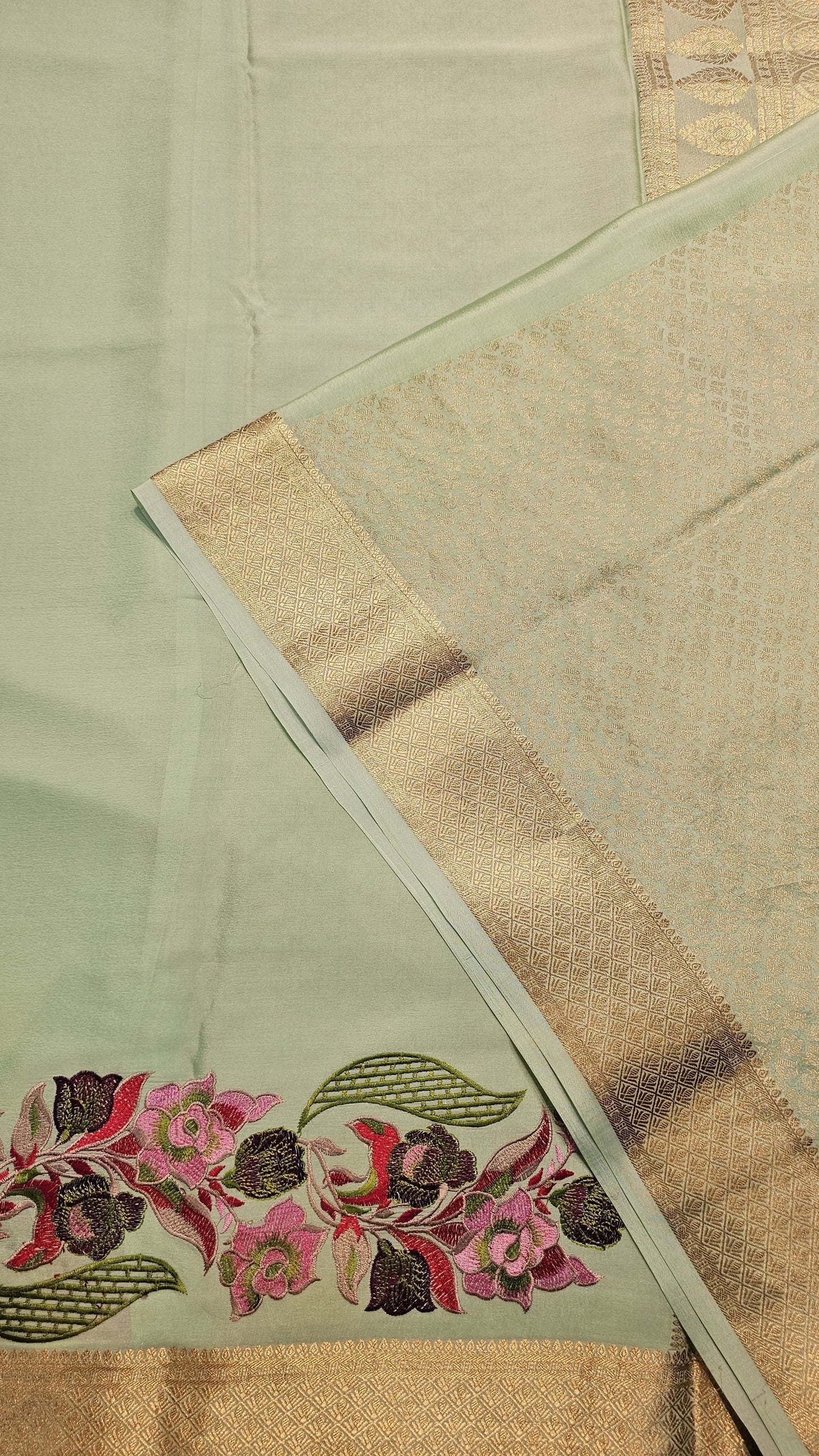 Mysore crepe silk saree with KSIC Finish in sea green in one side cutwork pattern