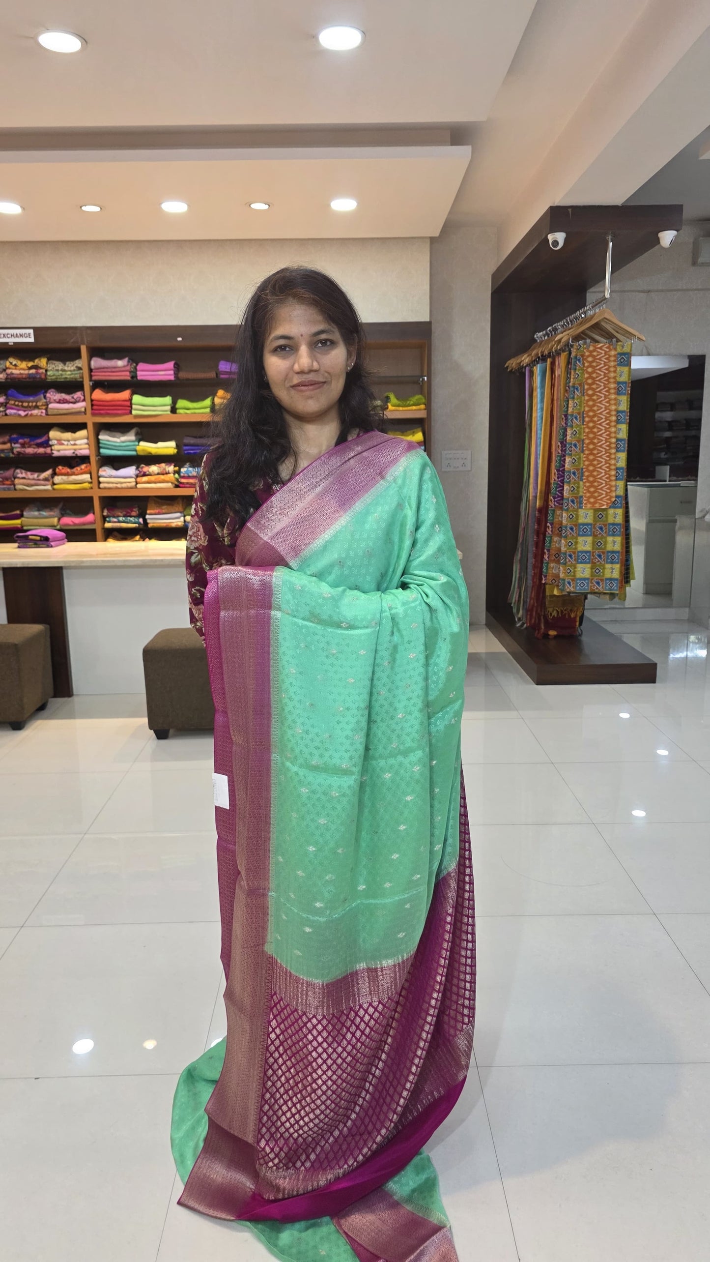 Mysore crepe silk saree with KSIC Finish in distemper green with rani pink in allover zari buttas pattern