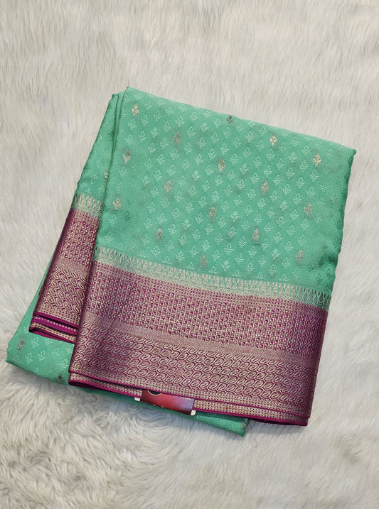 Mysore crepe silk saree with KSIC Finish in distemper green with rani pink in allover zari buttas pattern