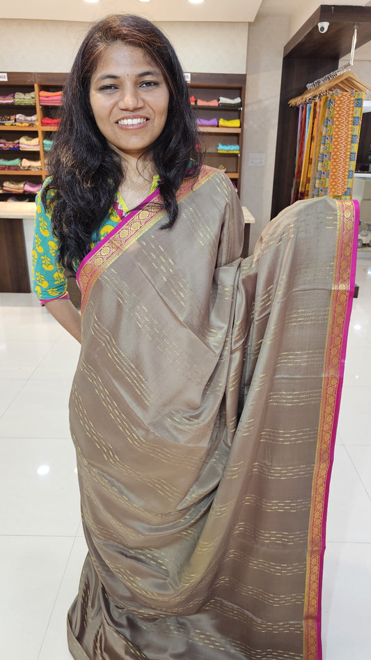 Mysore crepe silk saree with KSIC Finish in kiwi with rani pink in brocade zari pattern