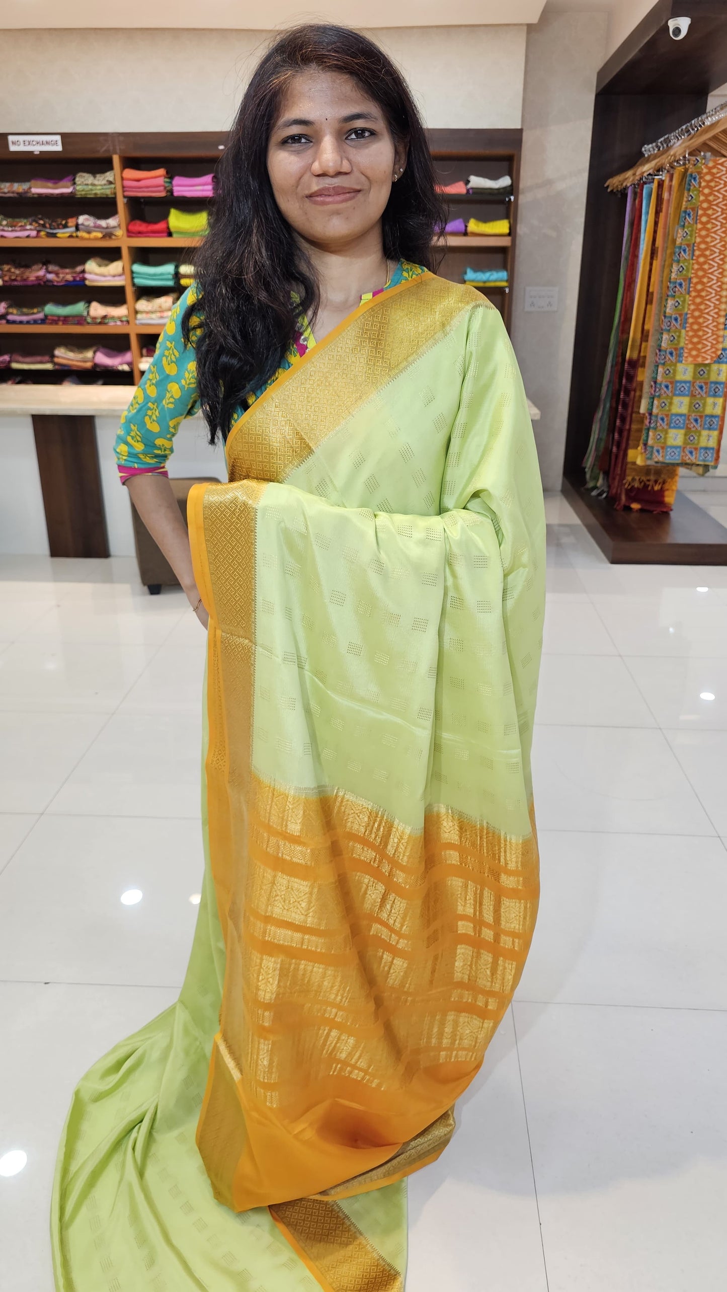 Mysore crepe silk saree with KSIC Finish indistemper green with mango yellow in checks pattern