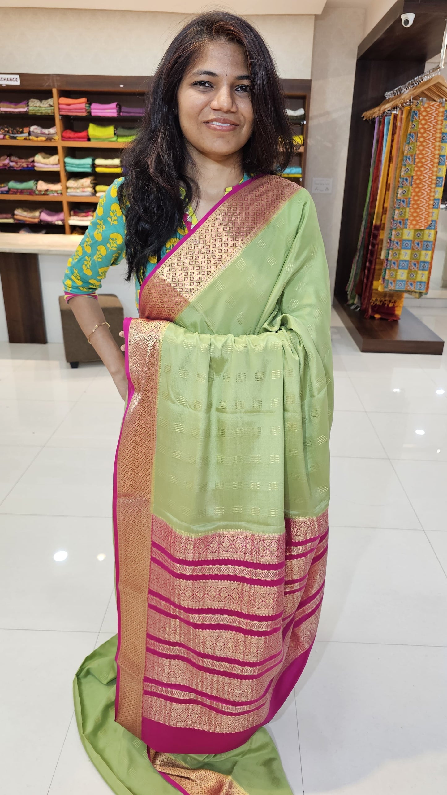 Mysore crepe silk saree with KSIC Finish in pista green with rani pink in checks pattern