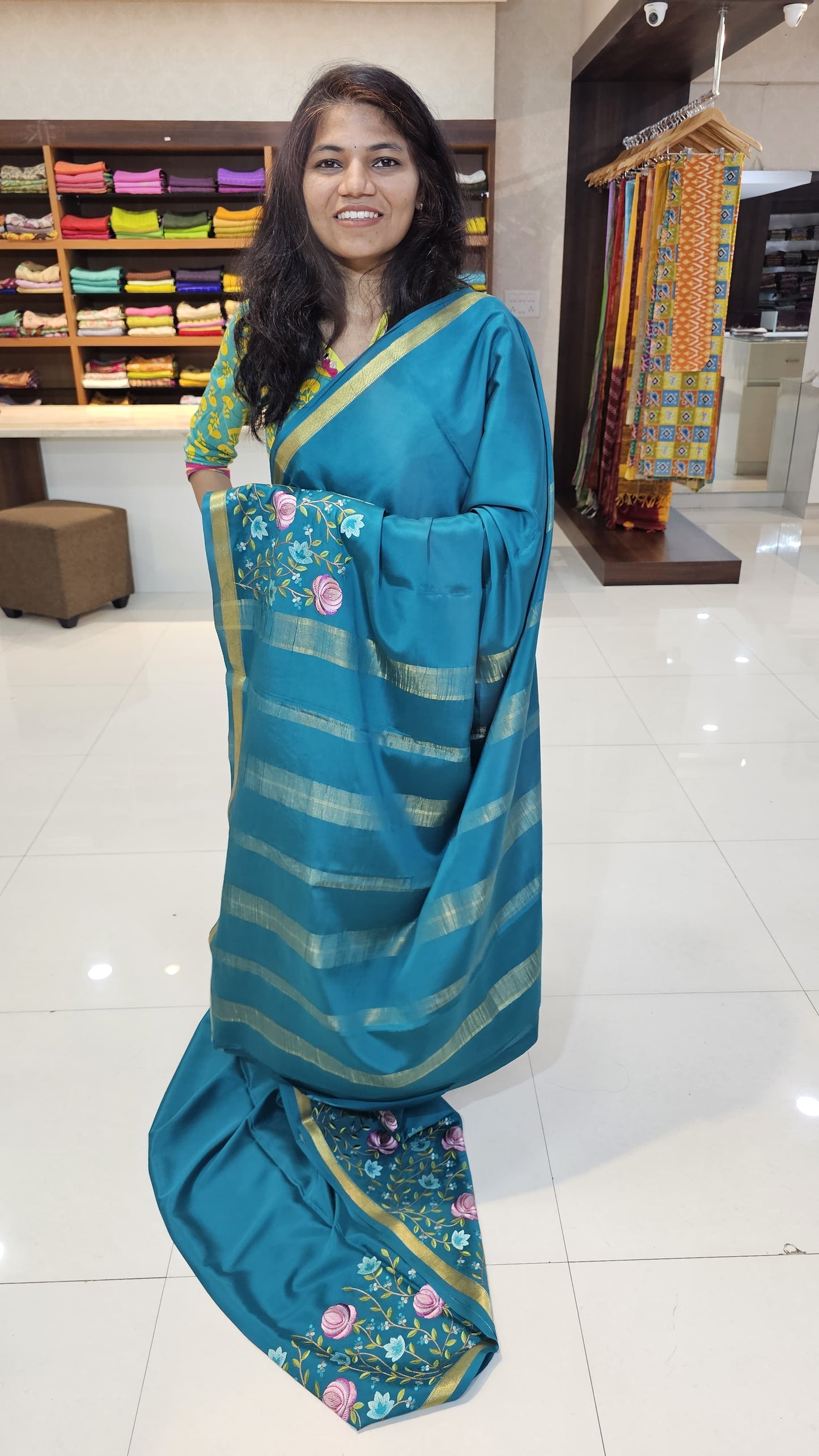 Mysore crepe silk saree with KSIC Finish in rama green self in embroidey pattern