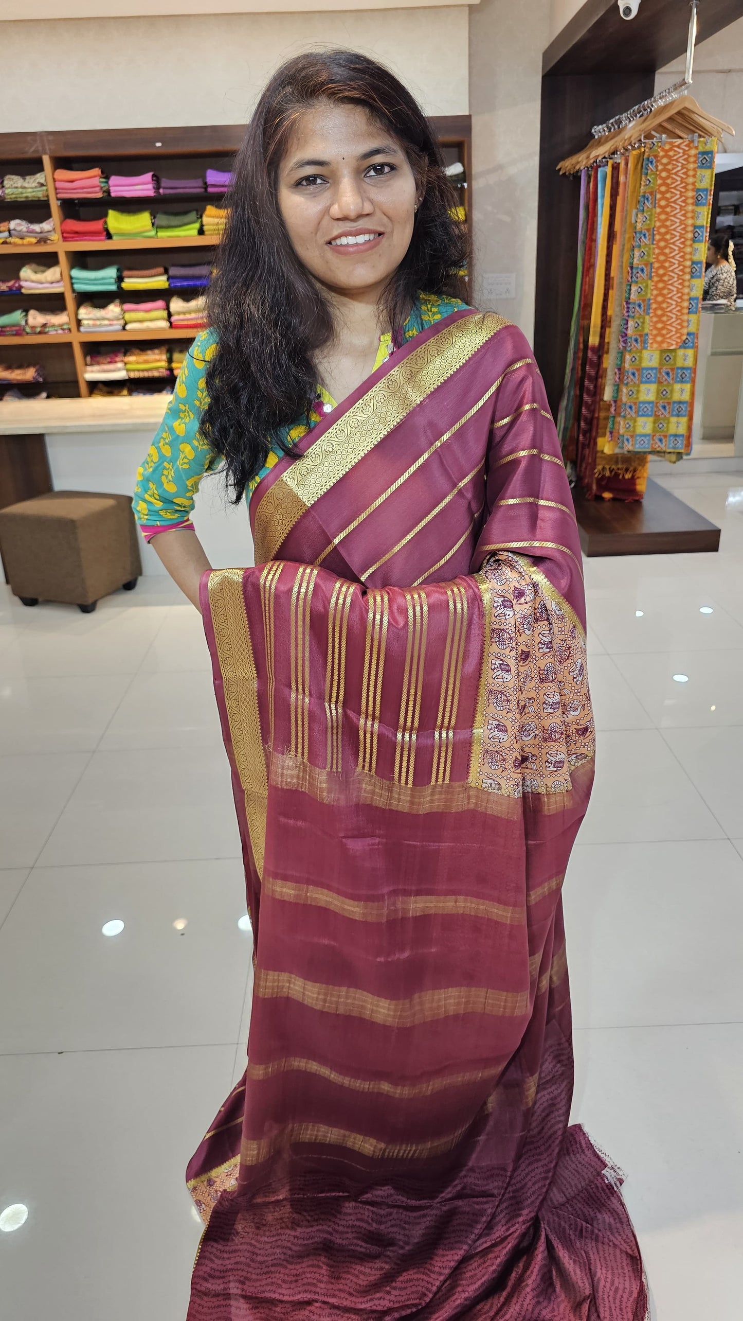 Mysore crepe silk saree with KSIC Finish in peach with wine in kalamkari pattern