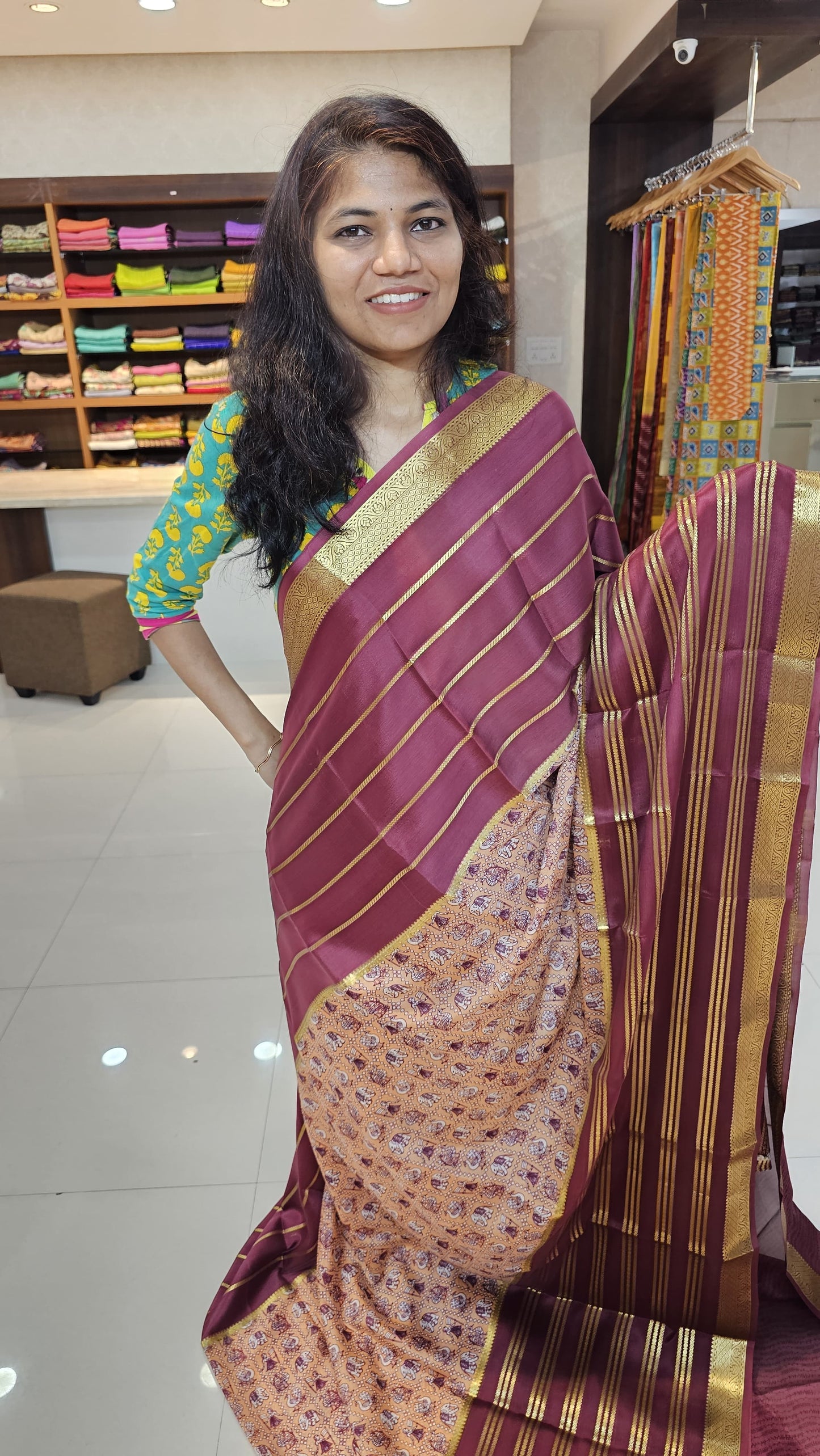 Mysore crepe silk saree with KSIC Finish in peach with wine in kalamkari pattern