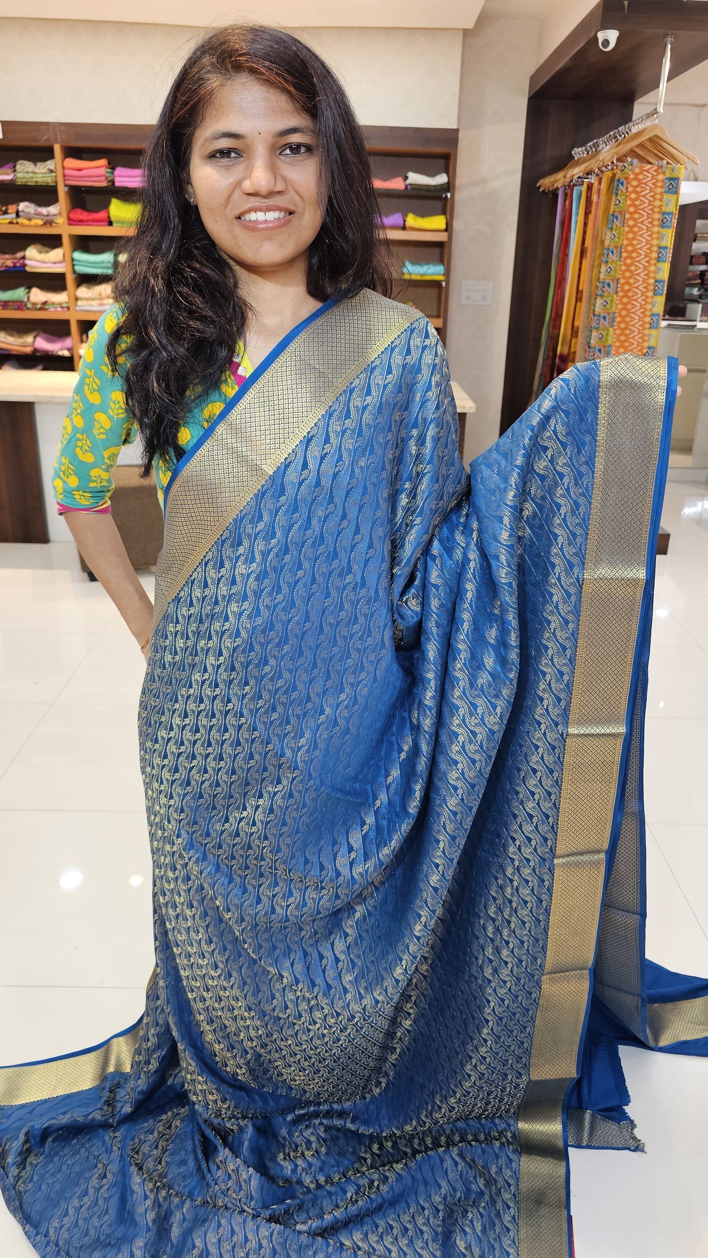 Mysore crepe silk saree with KSIC Finish in peacock blue in allover zari brocade pattern