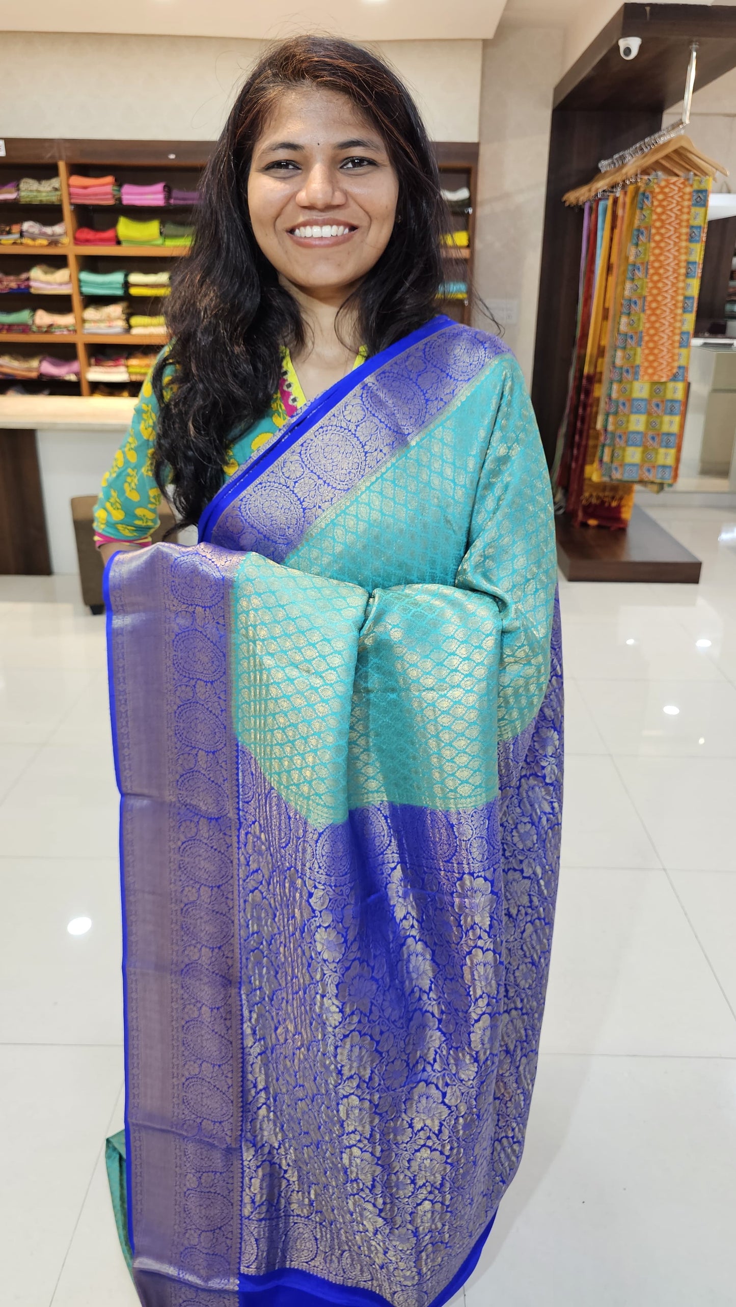 Mysore crepe silk saree with KSIC Finish in rama green with royal blue in brocade zari pattern