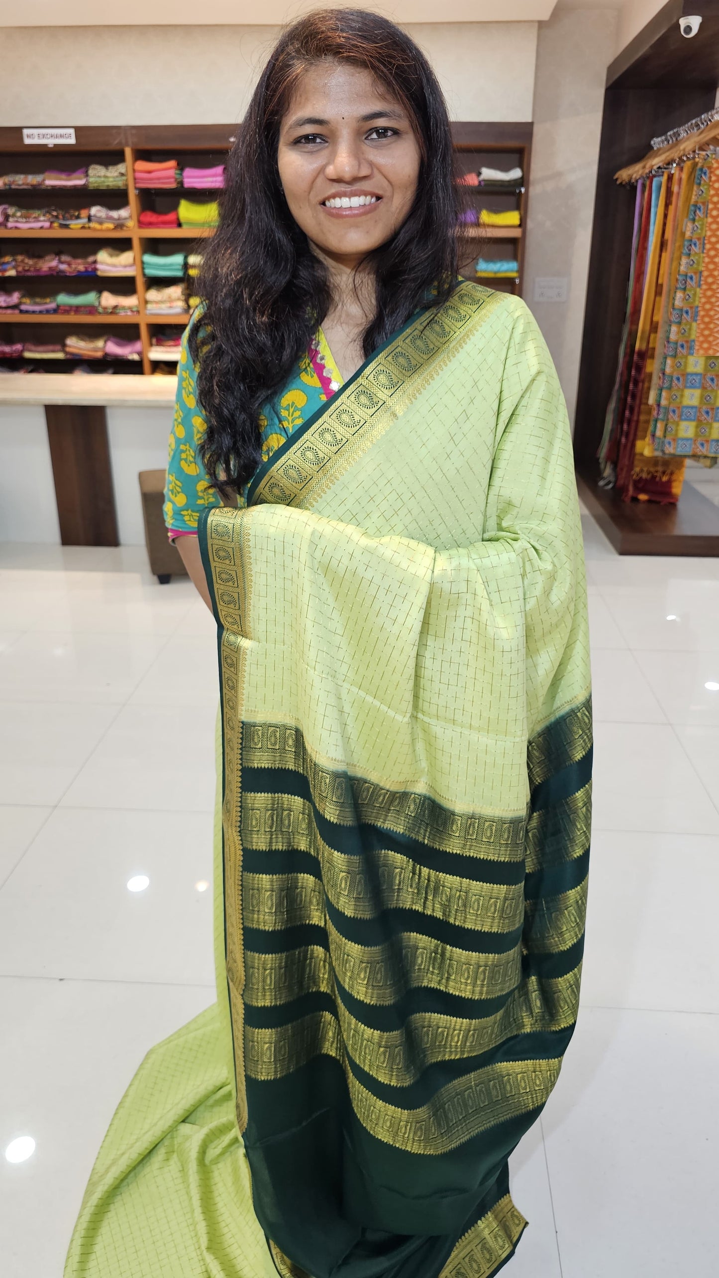 Mysore crepe silk saree with KSIC Finish in pista green with bottle green in checks pattern