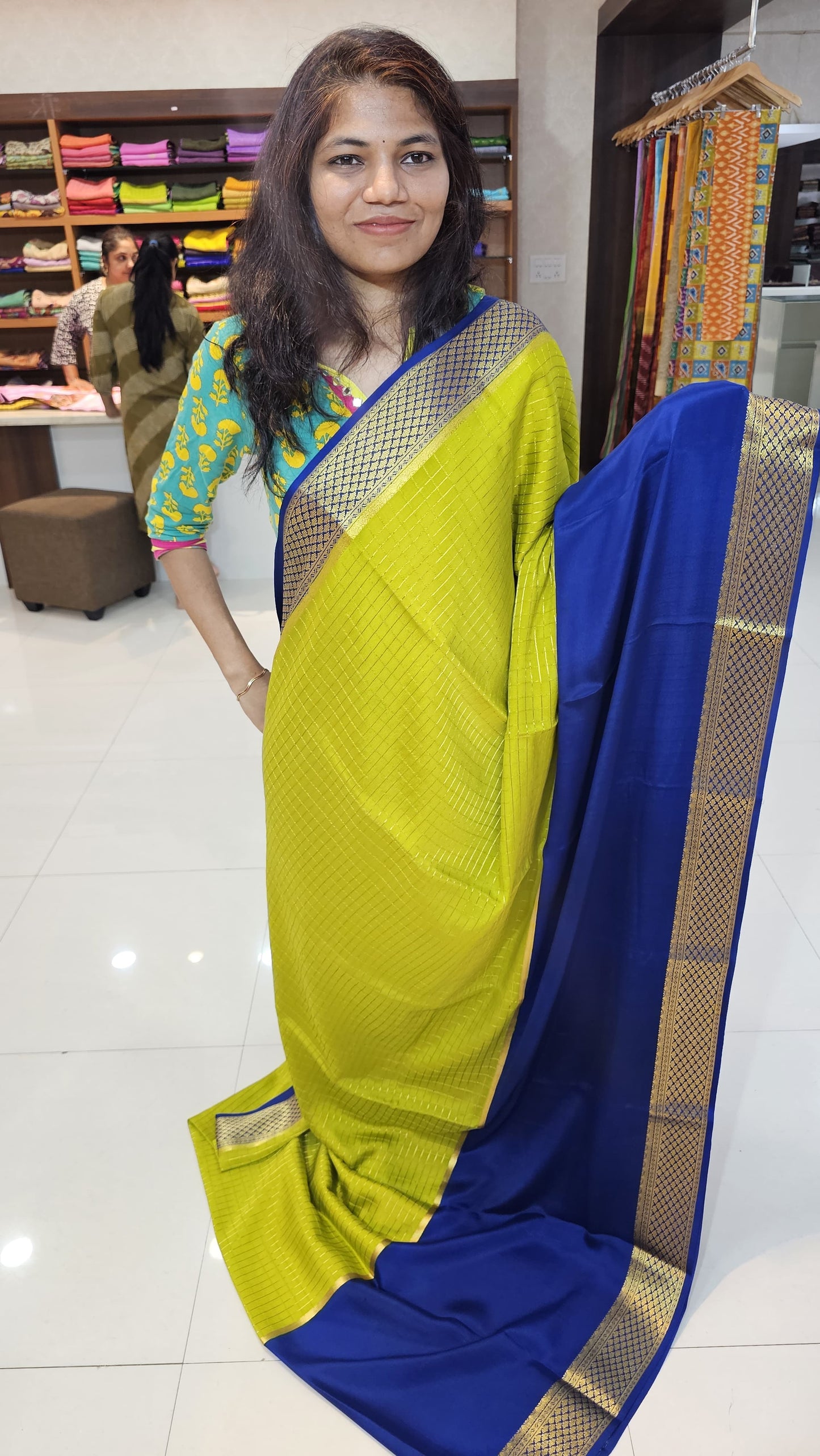 Mysore crepe silk saree with KSIC Finish in lemon green with royal blue in half and half checks pattern