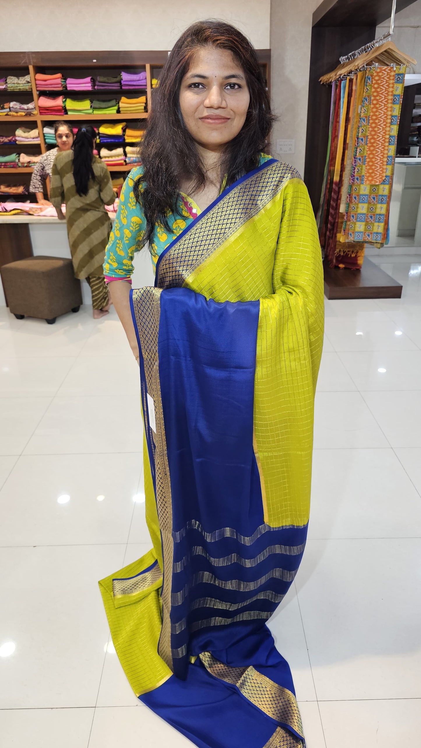 Mysore crepe silk saree with KSIC Finish in lemon green with royal blue in half and half checks pattern