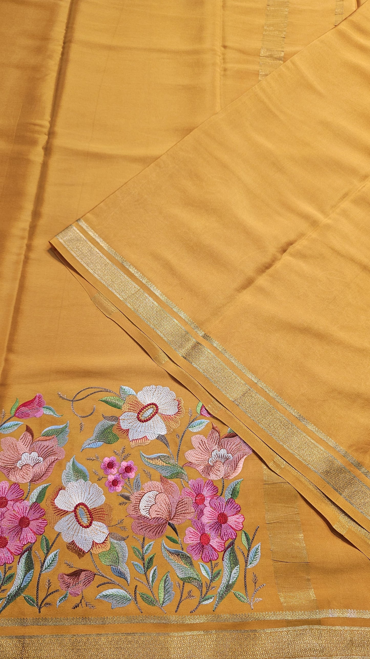 Mysore crepe silk saree with KSIC Finish in mango yellow self in embroidery pattern