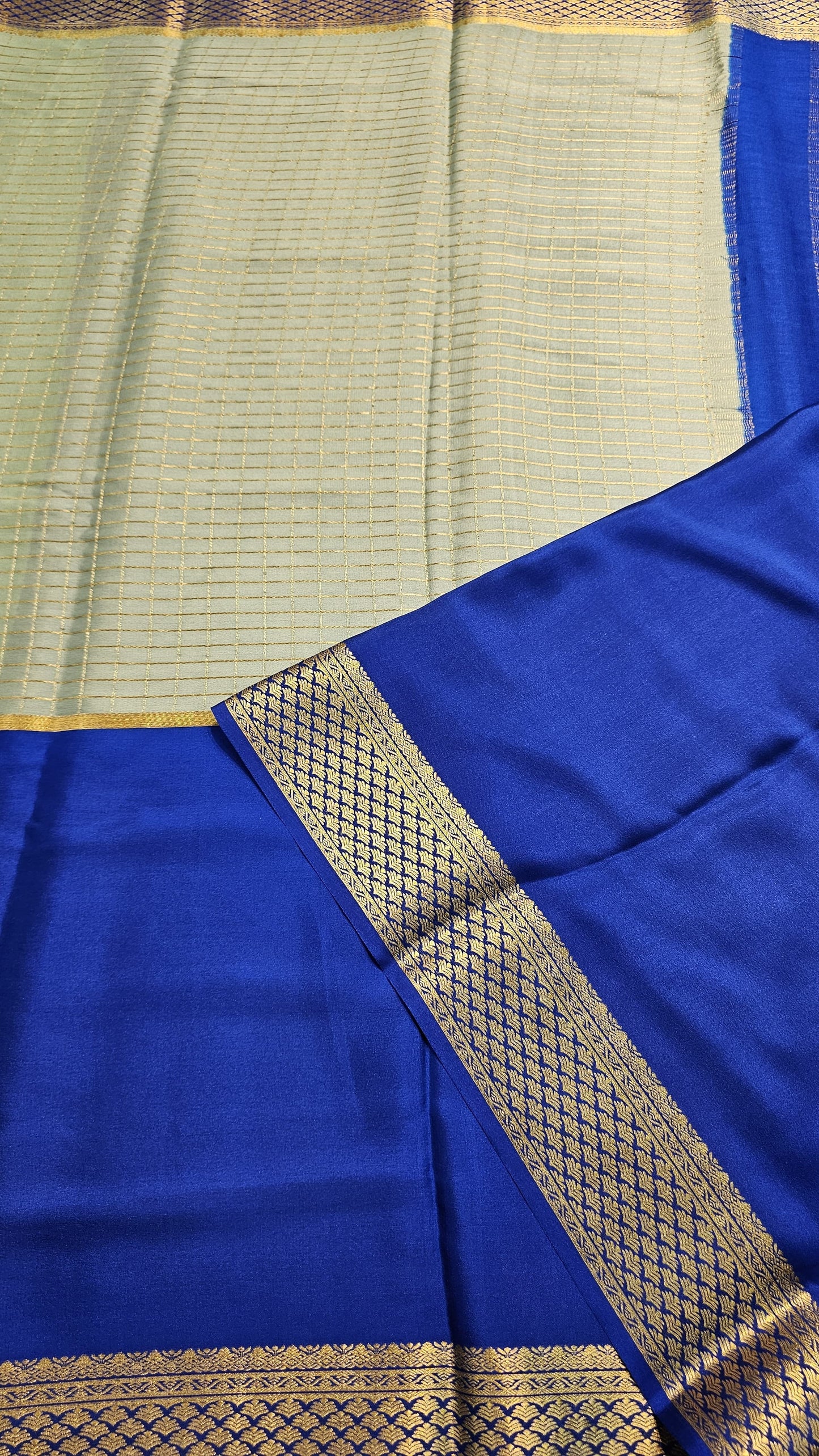 Mysore crepe silk saree with KSIC Finish in mint with ink blue in half and half checks pattern