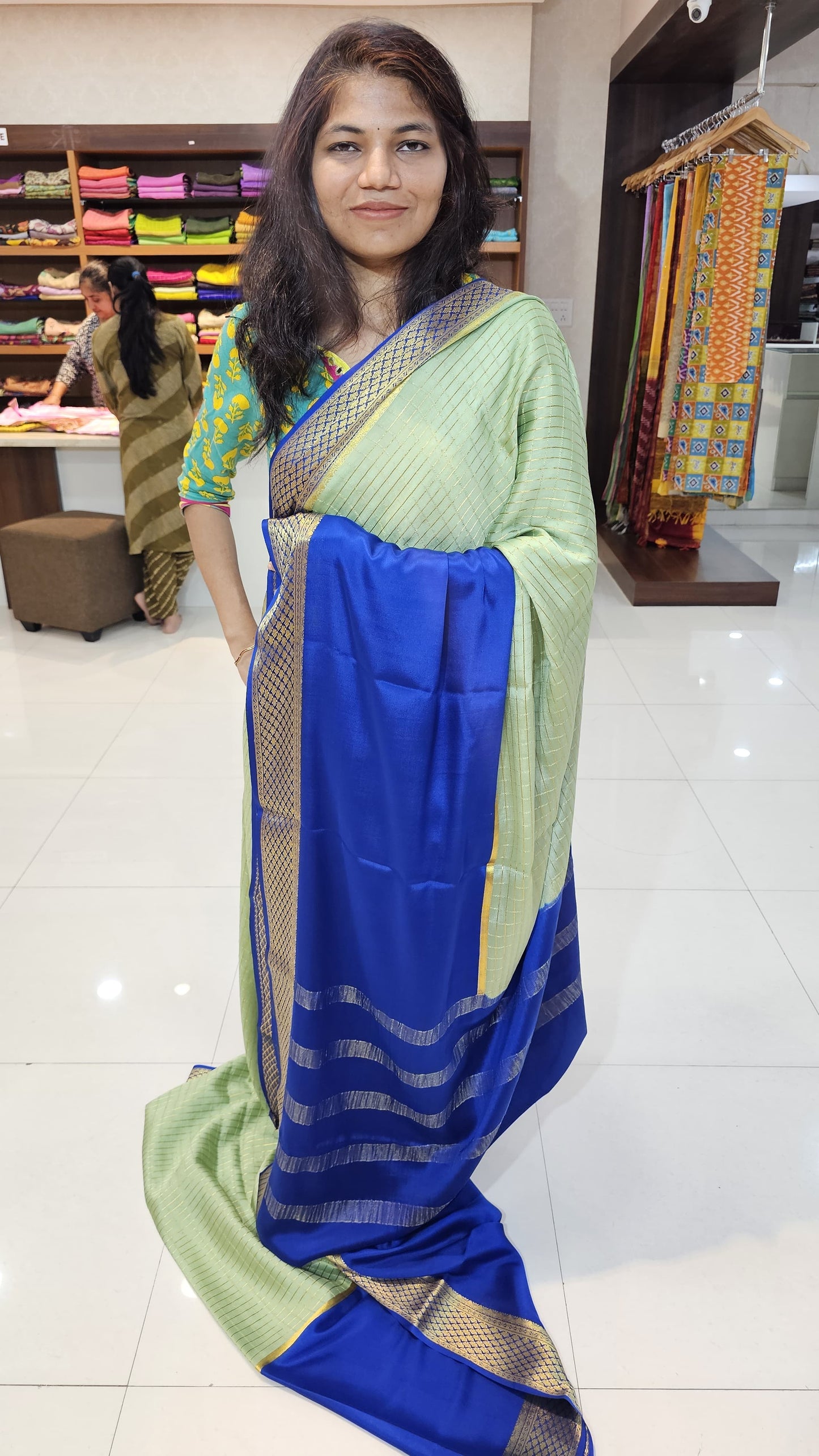 Mysore crepe silk saree with KSIC Finish in mint with ink blue in half and half checks pattern